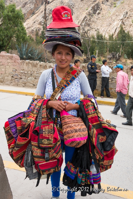 2242 Hat girl, Ollantaytambo train station.jpg